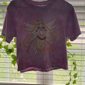 shirt with sailor moon on the front of it with pink and white tie-dye on back